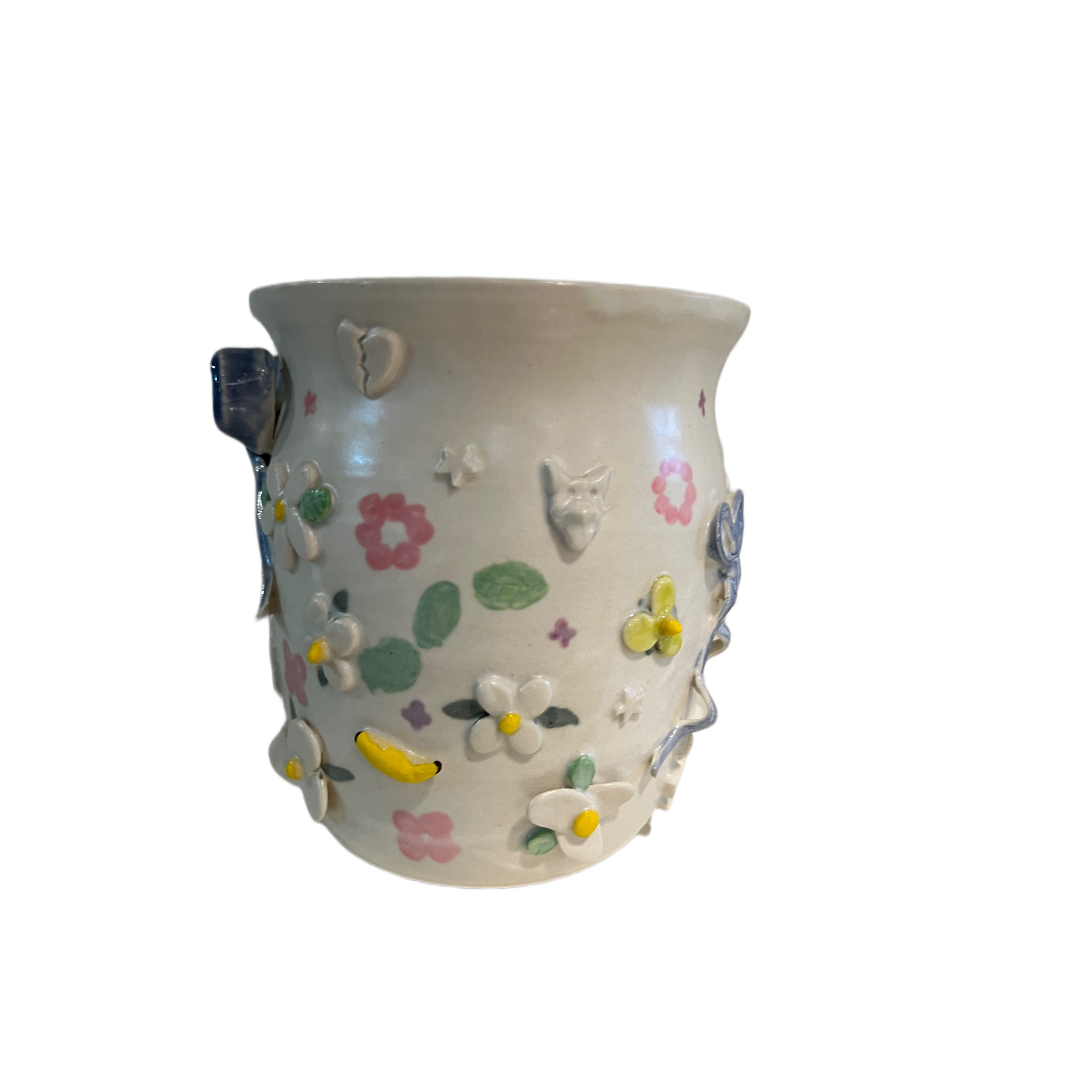 Ceramic vessel with pastel flowers, butterflies, and dimensional appliques on a cream ground
