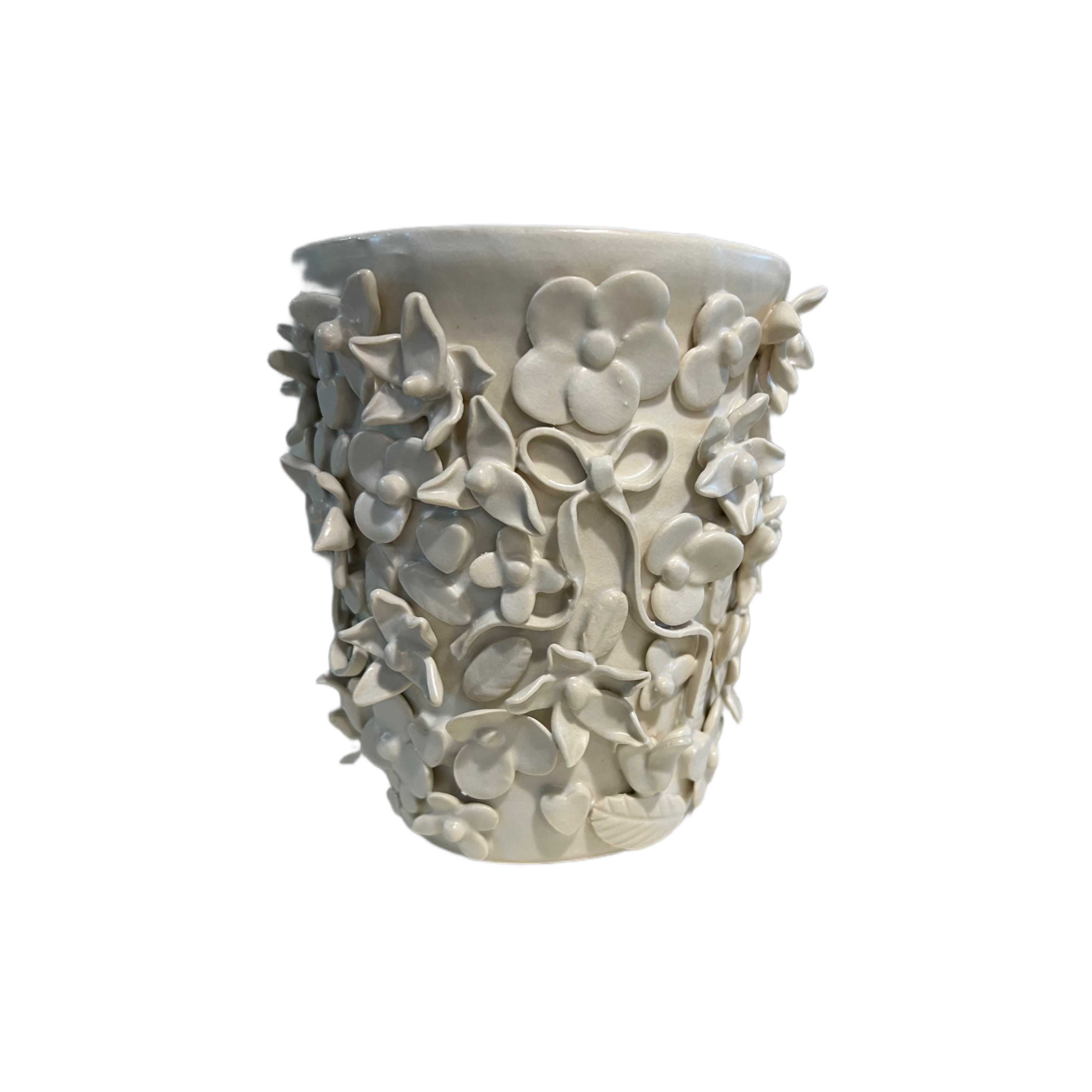 White porcelain vessel with all-over dimensional floral appliques